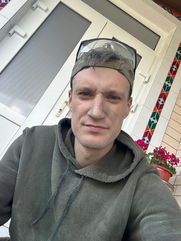 Selfie series in Makiv: camo gear, safety glasses, green face paint