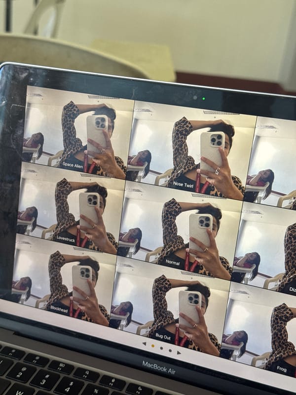 Person reviews filtered selfies on MacBook in Davao City