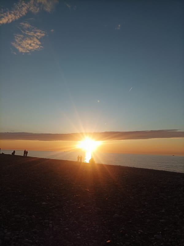 Sunset observed over Black Sea beach in Batumi, Georgia