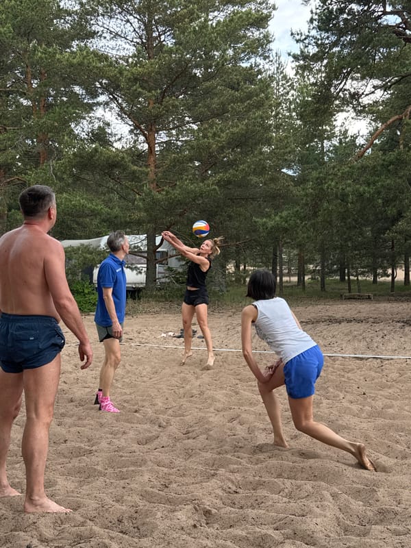 Beach volleyball game played in pine forest, Zelenaya Roshcha
