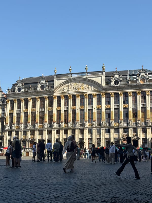 Grand Place buzzing on a sunny Brussels afternoon
