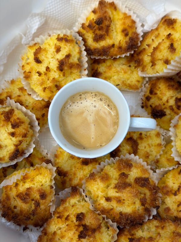 Morning coffee and coconut macaroons captured in Leudelange