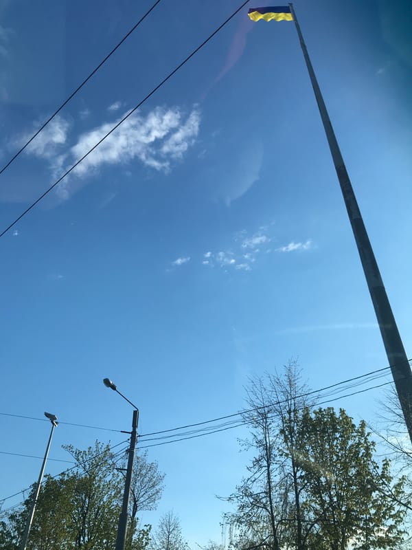 Spring day scenes captured in Kharkiv showing flag, streets