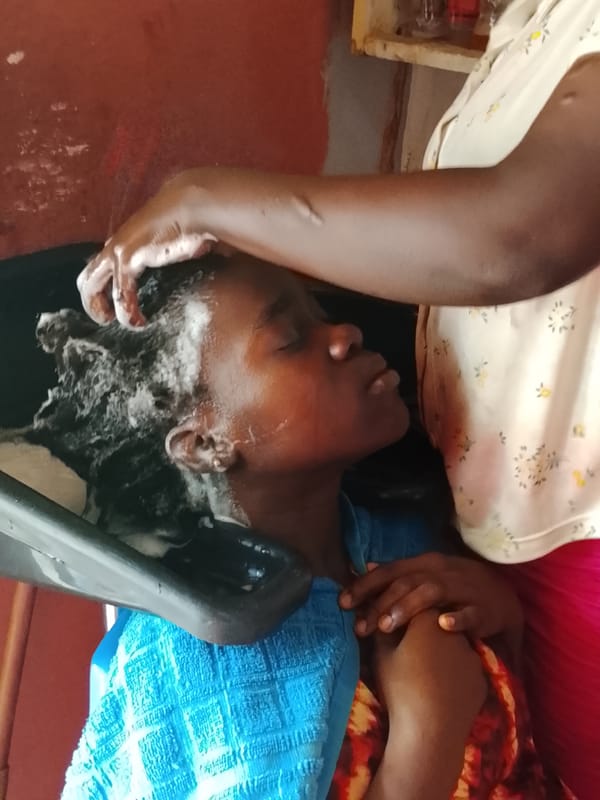 Hair washing session captured at salon in Akwanga, Nigeria