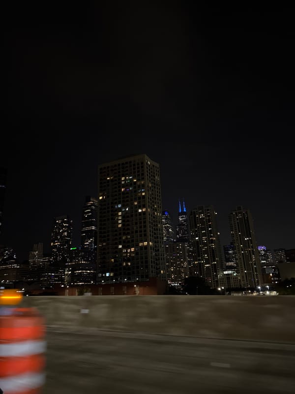 Chicago skyline captured from moving vehicle during early morning hours