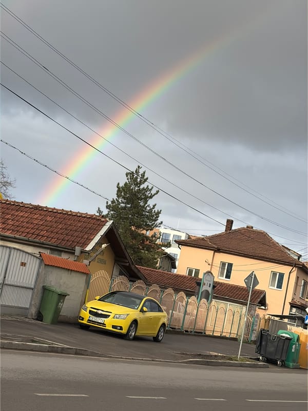 Rainbow appears over residential street in Kostinbrod, Bulgaria