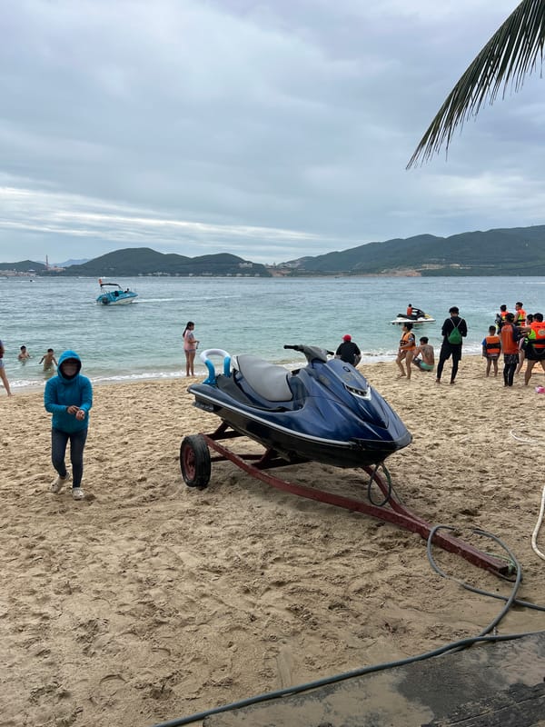 Watersports gear and action on a cloudy Nha Trang morning