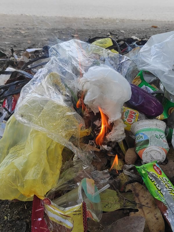 Small trash fire burns in Lhokseumawe, Indonesia