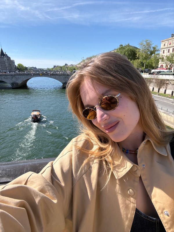 Young woman photographed on sunny afternoon in Paris