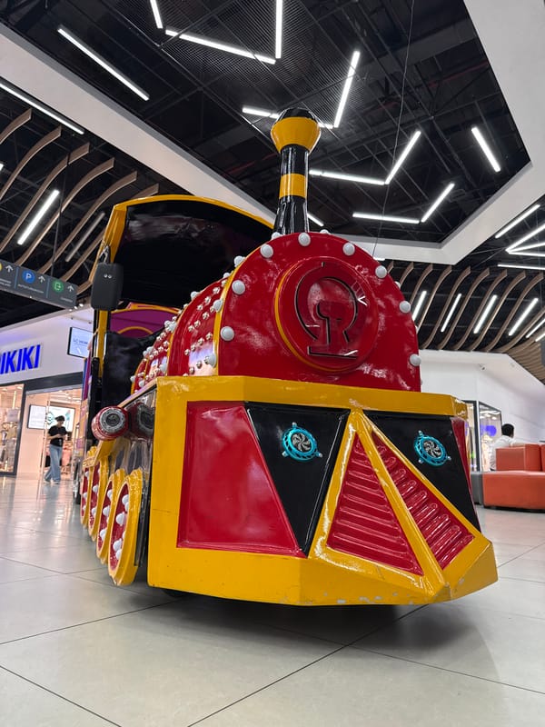 Daily life captured in Tashkent: toy trains, fruit markets