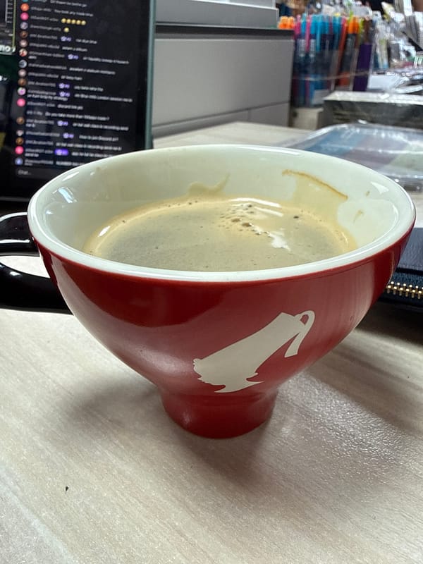 Red coffee mug on a textured surface, Aksakovo