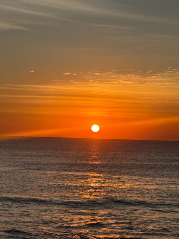 Beach day fades into a warm Bali sunset