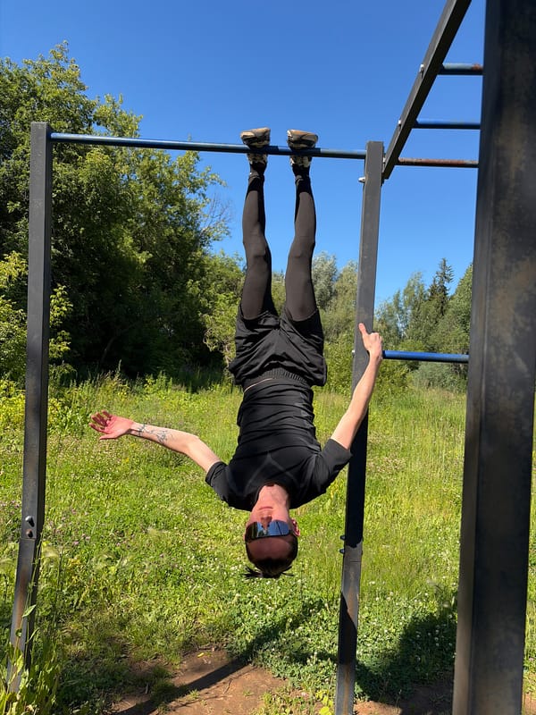 Outdoor bar workout session with a few casual moments mixed in.