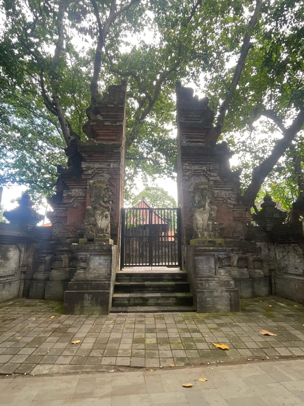 Traditional stone gateway observed in Denpasar, Indonesia