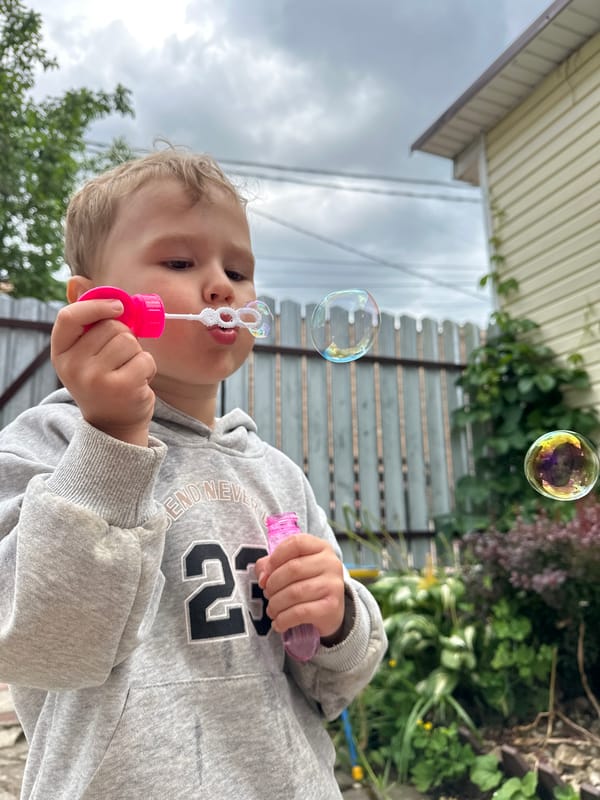 Backyard bubble play in a Nizhny Novgorod garden