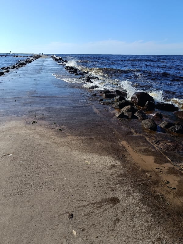 Sunny afternoon along Riga's Baltic pier and shoreline