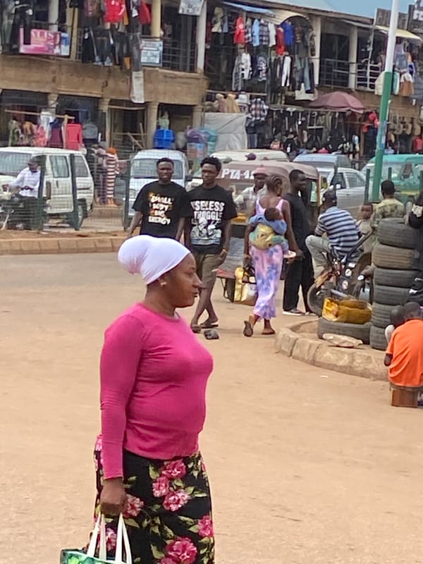 Morning market activity captured in Bukuru, Nigeria street scene