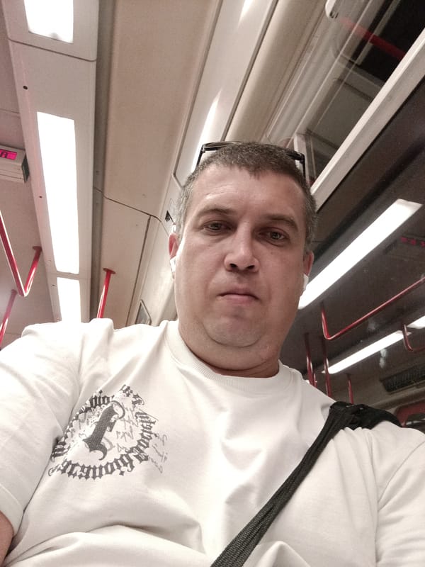 Selfies on the Prague metro, early evening commute.