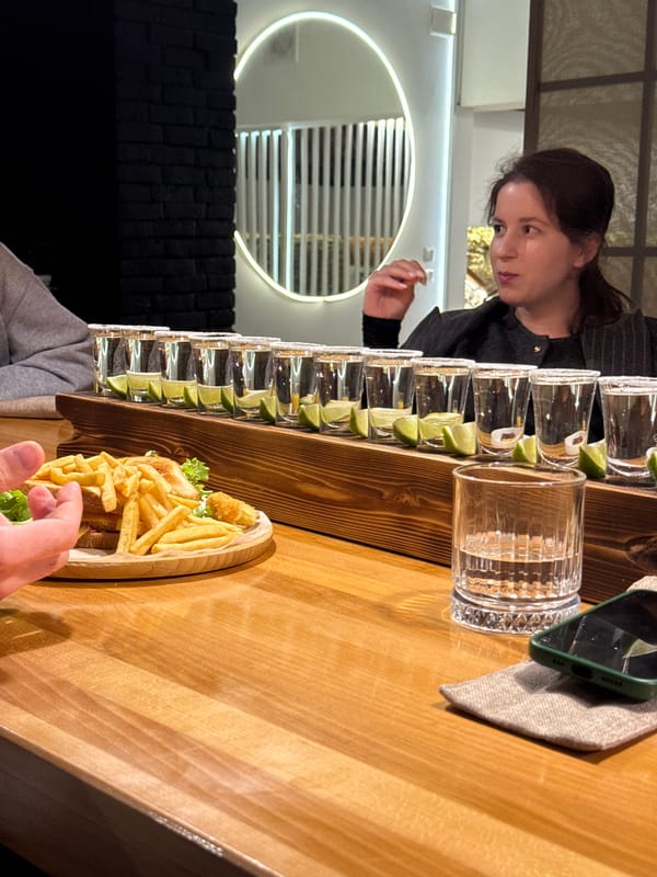 Evening social gathering documented at Sokhumi restaurant with tequila shots