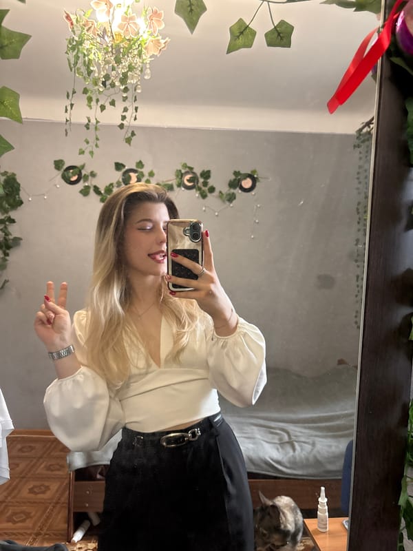 Bedroom mirror selfie session with a dog in the mix