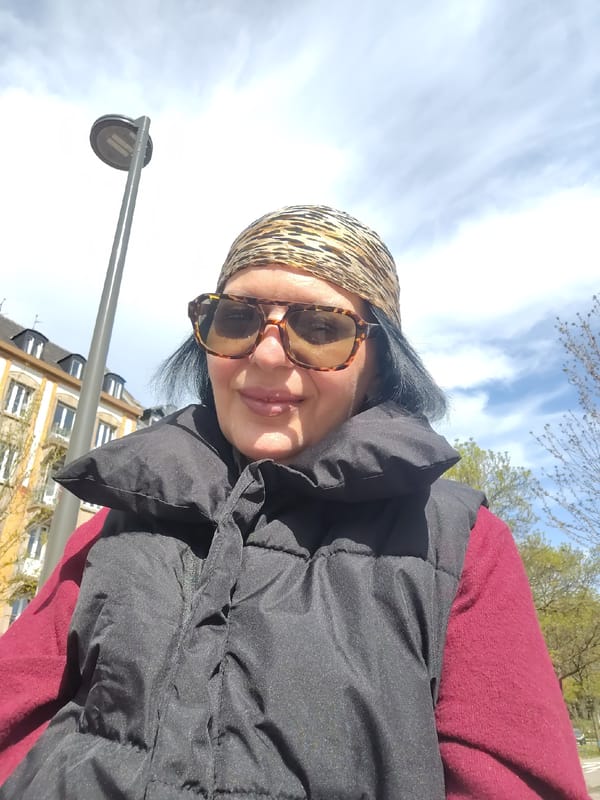 Woman takes selfie on Strasbourg street