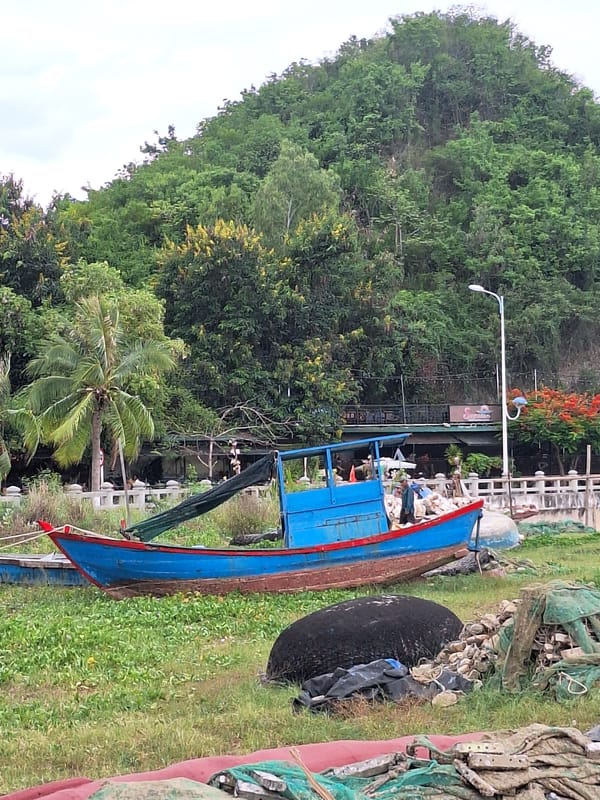 Nha Trang's waterfront: boats, promenade, and beachside streets