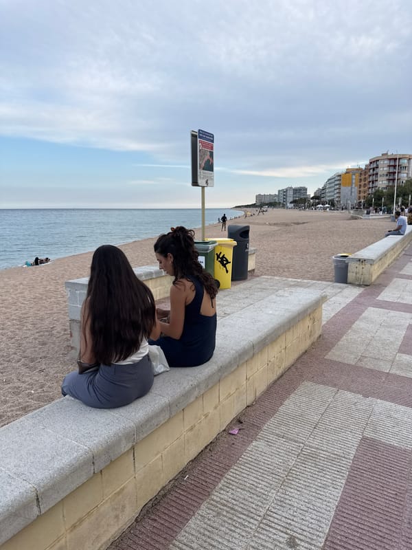 Summer afternoon across Blanes beach and waterfront promenade