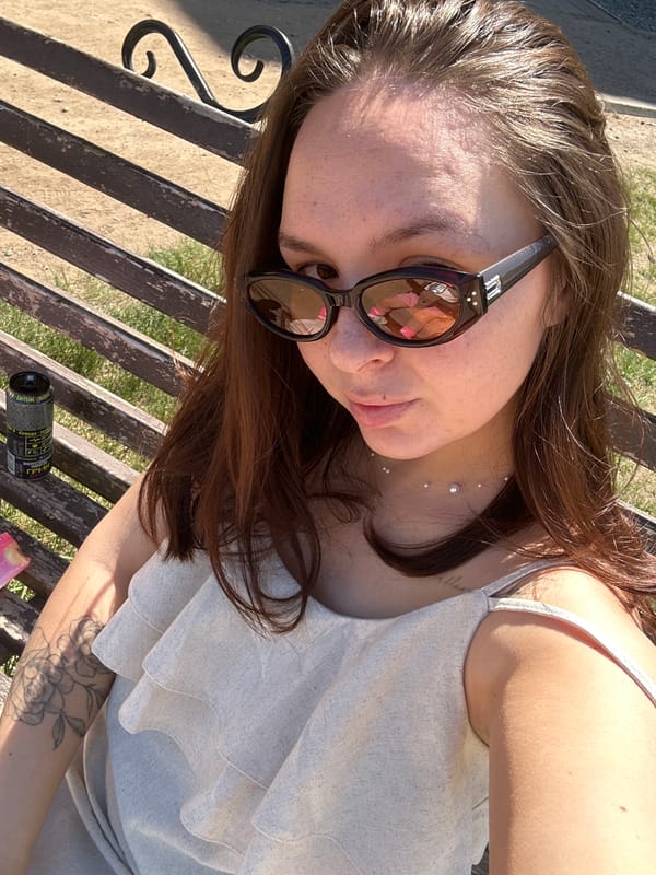 Woman enjoys casual park morning with children in Chaikovsky