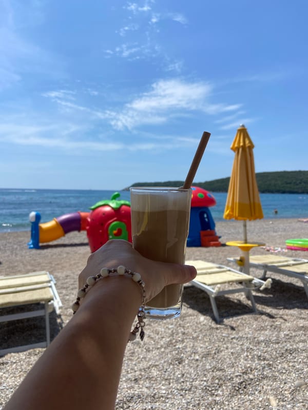 Summer beach activities and parasailing captured in Prijevor, Montenegro