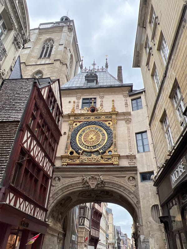 Tourist captures historic Rouen landmarks and antique markets