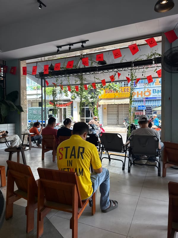 Early morning cafe visit documented in Nha Trang, Vietnam