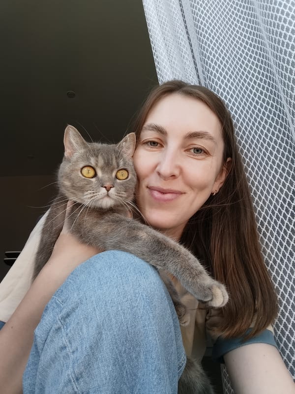 Woman documents morning routine with cat in Chaikovsky, Russia