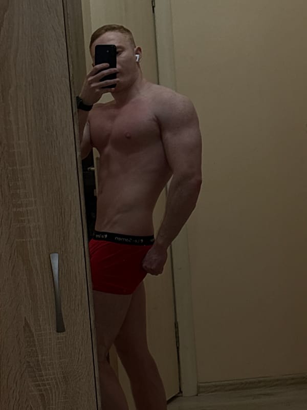 Man takes mirror selfies indoors in Chaikovsky, Russia