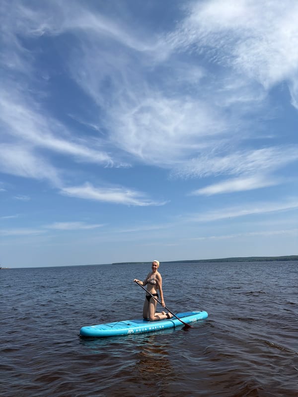 Summer paddleboarding and lakeside hangout in Chaikovsky