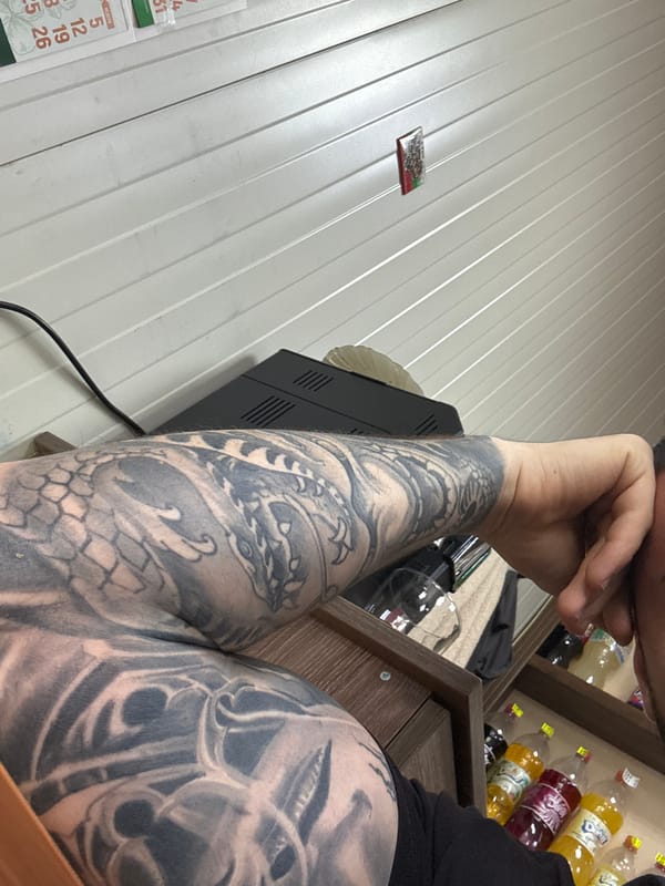 Rainy morning documented at Bulgarian industrial facility, tattoos photographed