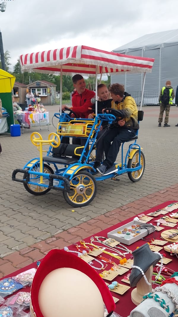 Handmade jewelry market on a brick plaza in Komsomolsk-on-Amur