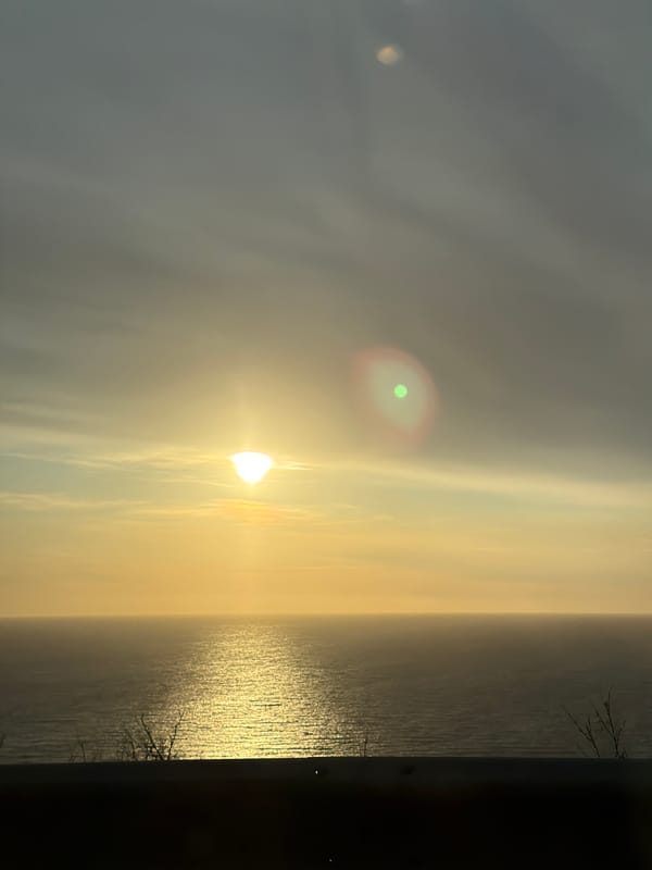 Hazy sunset captured over Montenegrin coast near Perazića Do