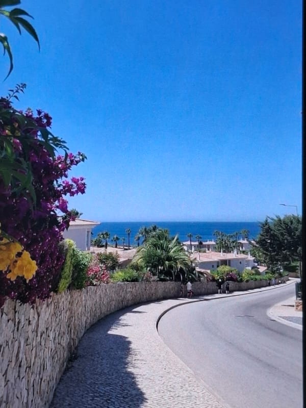 Person walks coastal promenade in sunny Burgas, Bulgaria