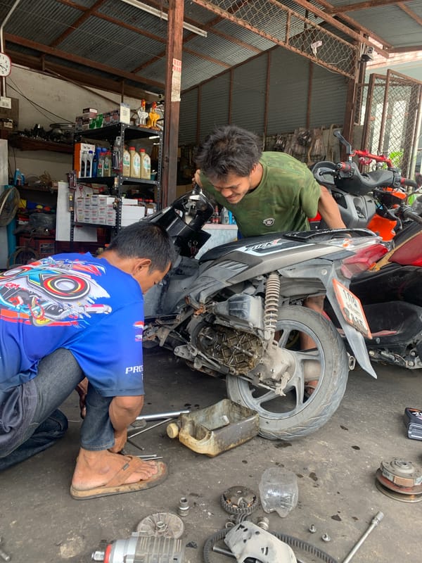 Motorbike repair and religious art observed in Thai coastal communities