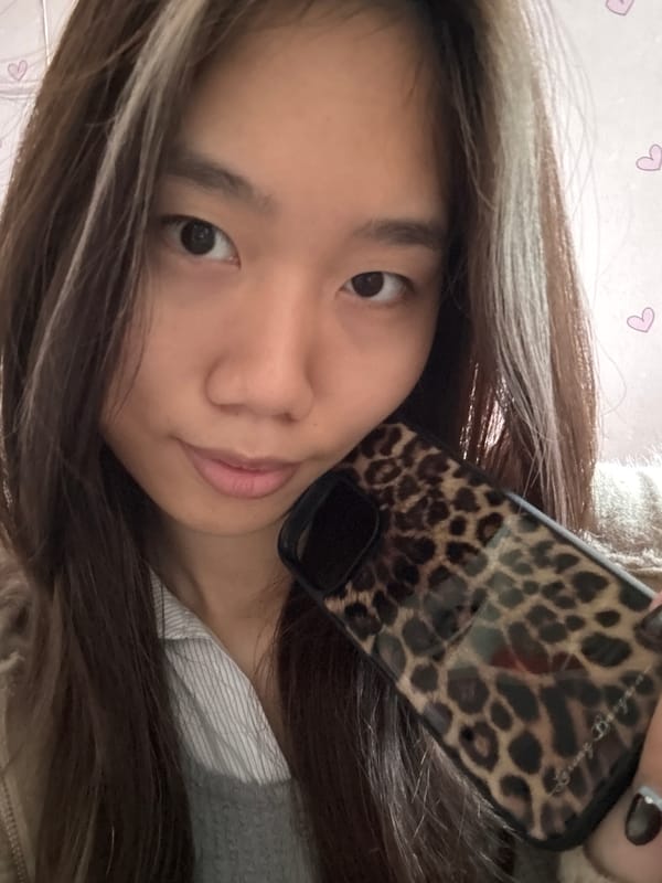 Woman takes multiple selfies with props in Chongqing apartment