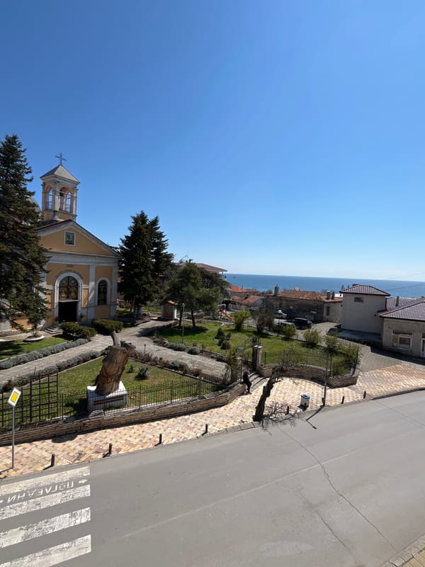 Yellow church with bell tower photographed in Balchik, Bulgaria