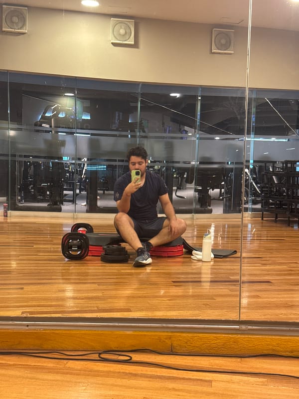 Young man takes selfie on gym floor in Puebla