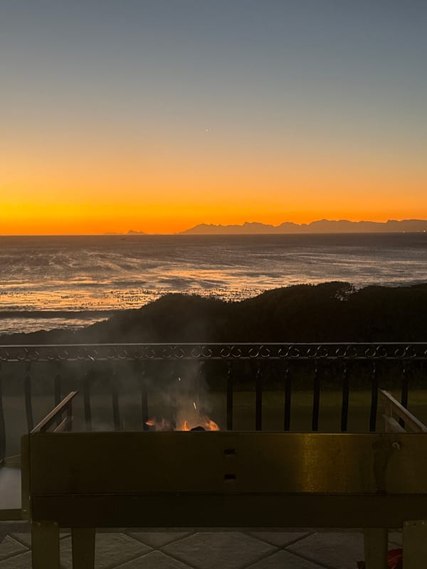 Sunset dinner preparation captured at Gans Bay coastal home