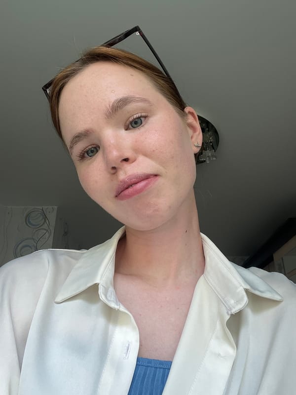 Woman documents morning outfit change in Chaikovsky apartment selfies