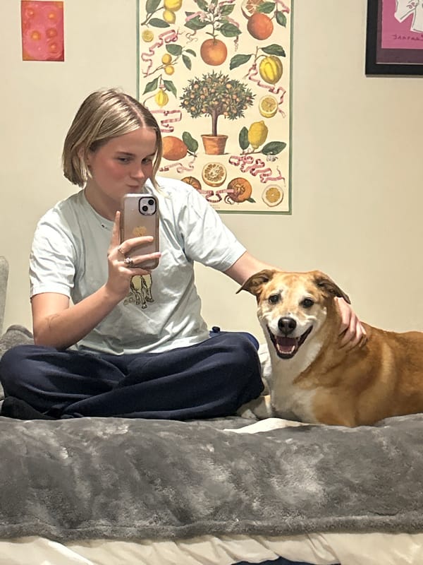 Person takes selfie with dog at home in Vancouver