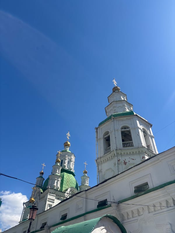 Morning architectural documentation in Krasnoyarsk captures cathedral and ornate buildings