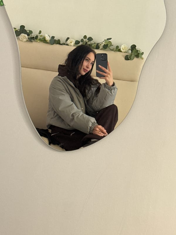 Woman takes mirror selfie in Foki, Russia