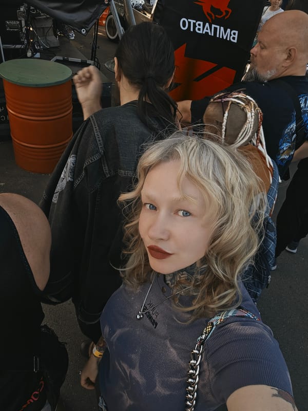 Live music and festive crowd at an outdoor event