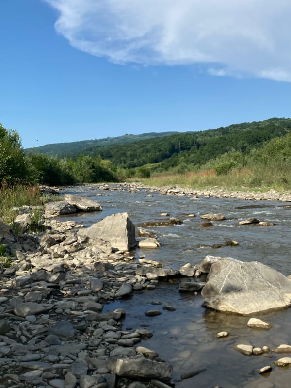 Tysa River's rocky banks and clear water, Velykyi Bychkiv