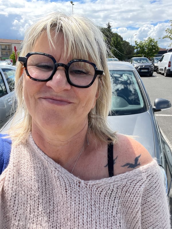 Woman visits flower nursery in Saint-Galmier, takes selfie